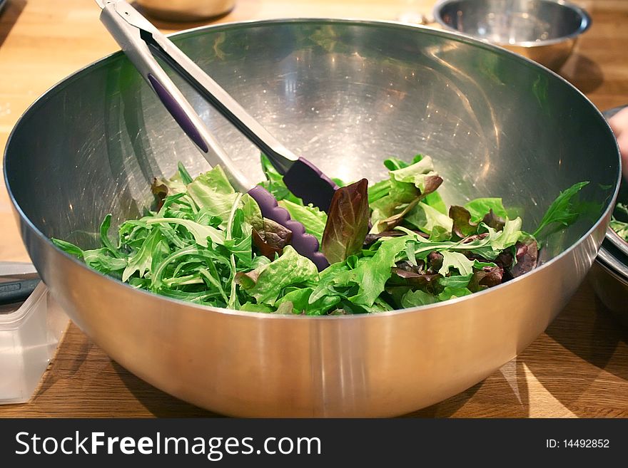 Beautiful fresh salad in a steel bowl. Beautiful fresh salad in a steel bowl