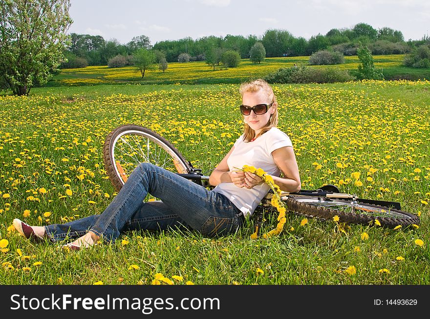 Outdoor shoot of young woman with bicycle