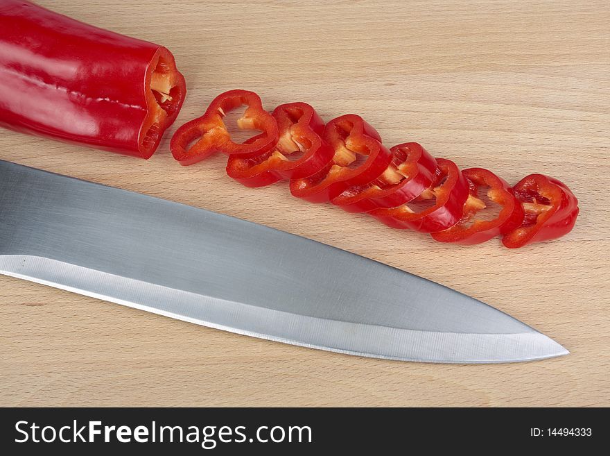 Cut Sweet red peppers and knife