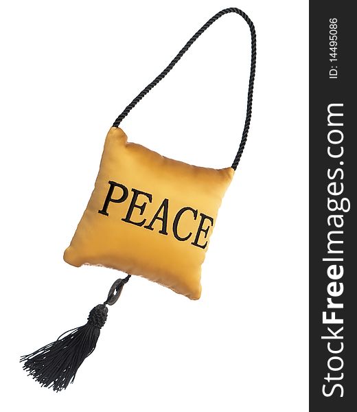 Chinese small satin pillow with the word 'Peace' embroidered on it. Tassel and cord. Pure white background without shadows for easy removal. Chinese small satin pillow with the word 'Peace' embroidered on it. Tassel and cord. Pure white background without shadows for easy removal.