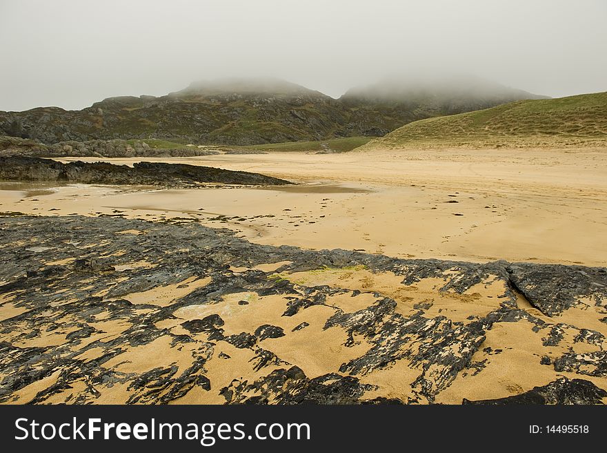 Rock pattern on beach with copy space.