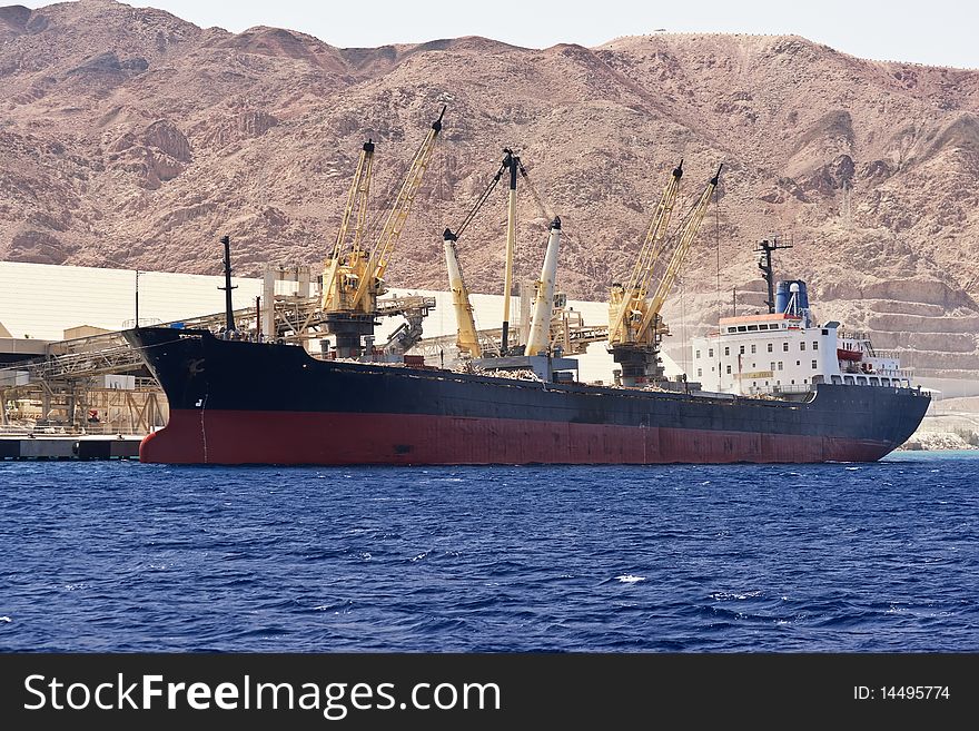 Cargo ship docked in Aqaba port. Jordan