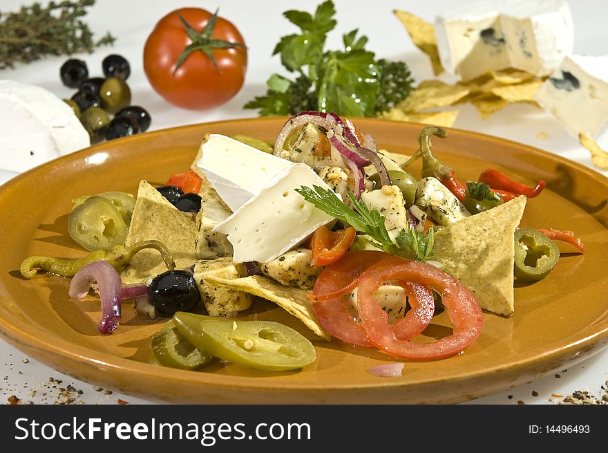 Cheese dish Mexican style v jalapenos and tortilla chips