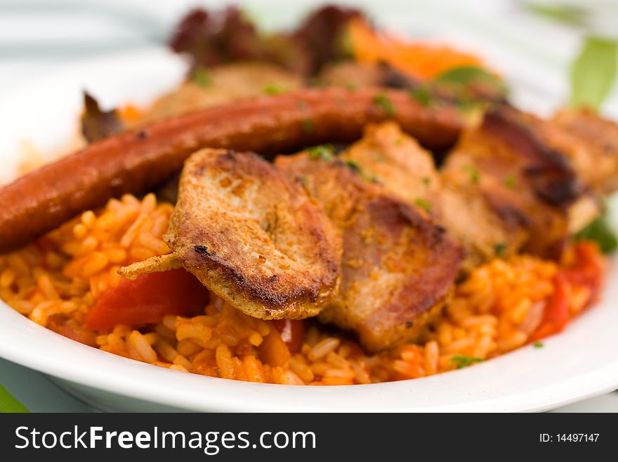 Big skewer,mixed meat,pork and lamb,with vegetable salad .