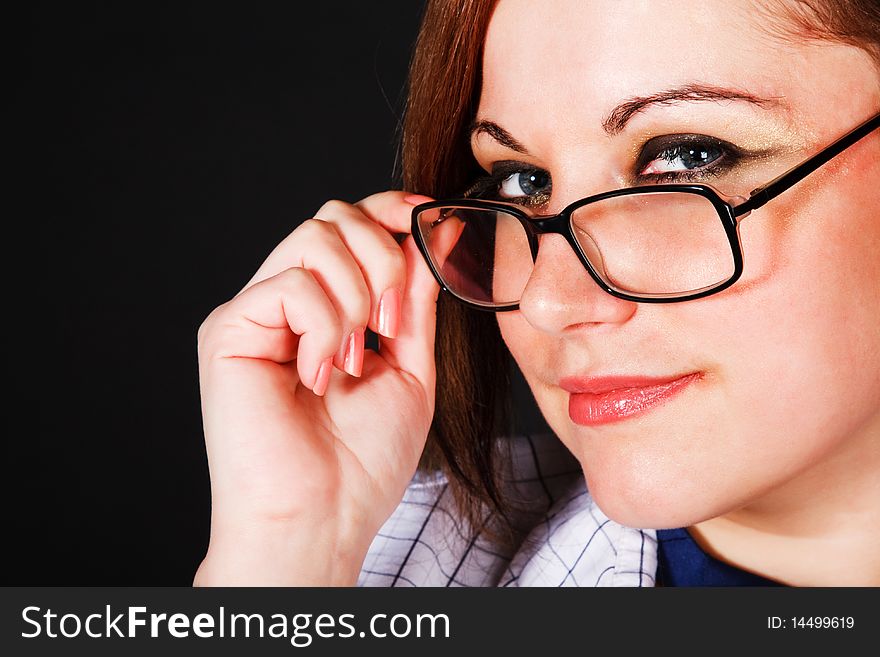 Portrait of a beautiful girl in eyeglassess