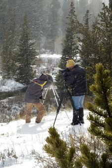 Photographers In Snowstorm Stock Photos