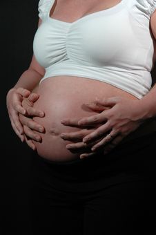 Pregnant Woman And Hands Royalty Free Stock Photo