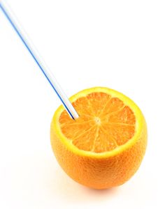 Orange Juice Drunk Directly From The Fruit Royalty Free Stock Photography Orange Juice Drunk Directly From The Fruit Royalty Free Stock Photography