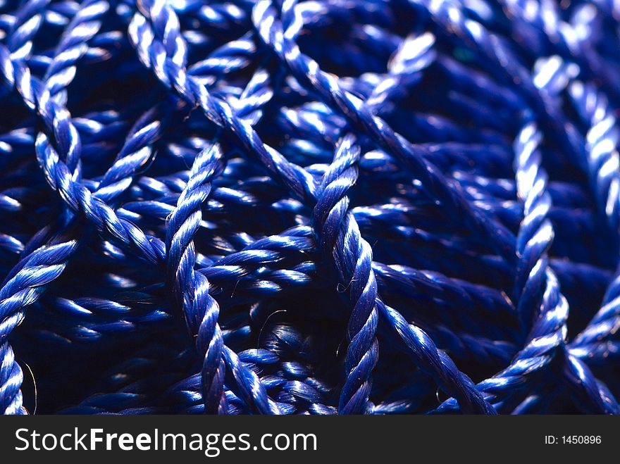 A crowd of blue cords building a network. A crowd of blue cords building a network