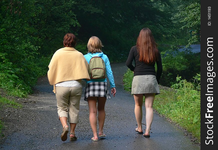 Mother and two daughters trekking in the mountains