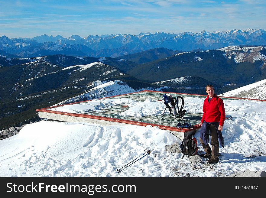 After a long hike, father and baby reached the top of Moose mountain (alberta,canada). After a long hike, father and baby reached the top of Moose mountain (alberta,canada).