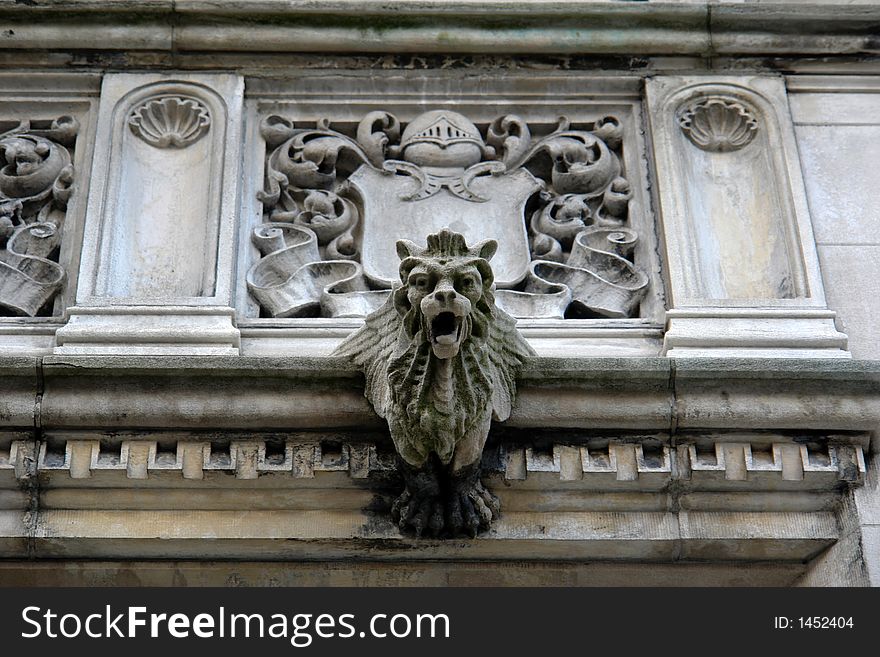 Detail  elaborate mansion with coat of arms