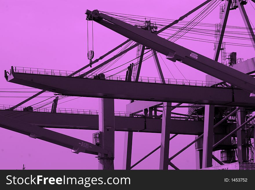 Abstract dockyard cranes in purple