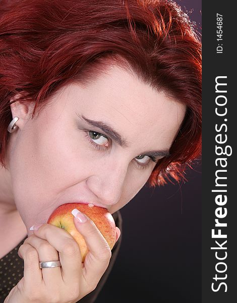 Girl eating apple