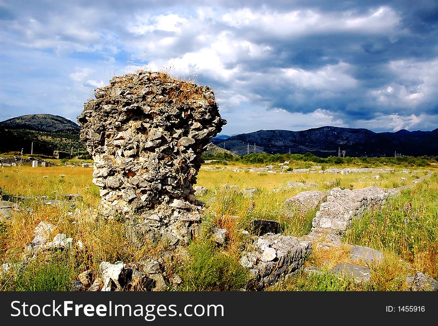 Remains of old roman abutment with fret and epitaph. Remains of old roman abutment with fret and epitaph.