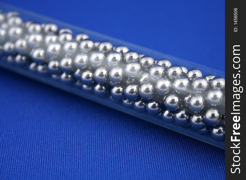 Many small chrome ball bearings.