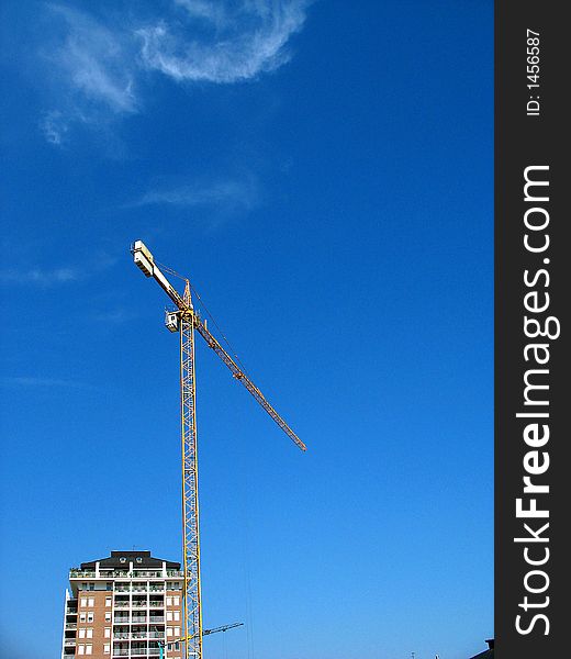 Crane working in a building yard