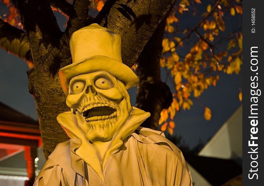 Halloween ghost on a neighbor's lawn on Halloween night. Halloween ghost on a neighbor's lawn on Halloween night.