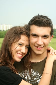 Young Man And Girl Embracing Outdoor Stock Photography