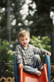 Cute Child On Slide Stock Photography Cute Child On Slide Stock Photography