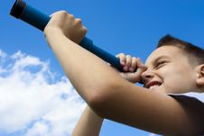 The Boy Looks Through A Telescope Stock Photo The Boy Looks Through A Telescope Stock Photo