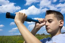 The Boy Looks Through A Telescope Stock Photography