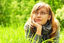 The Girl Lays On A Grass Stock Photography The Girl Lays On A Grass Stock Photography