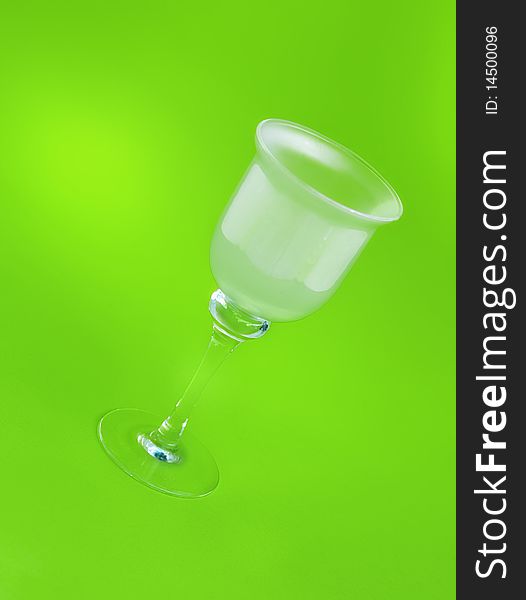 Glass isolated on green background