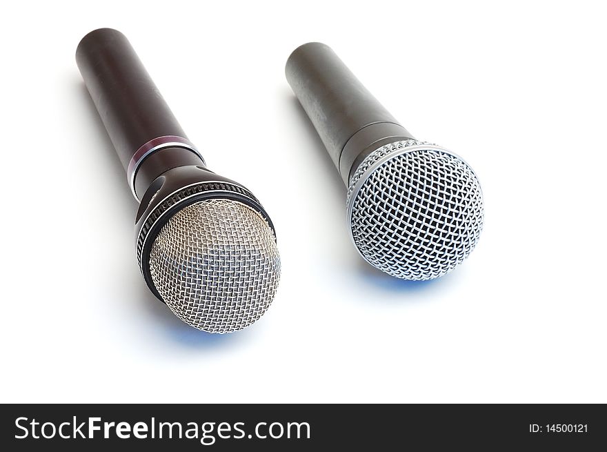 Two scenic microphones on a white background