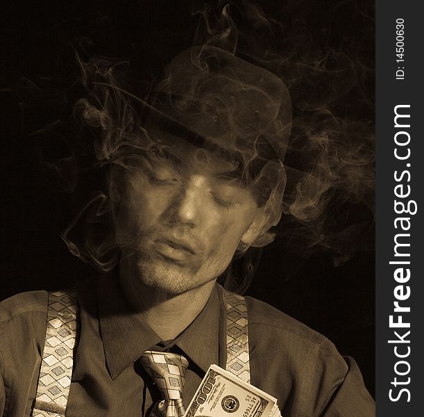 Old style photo of man counting money and smoking cigar