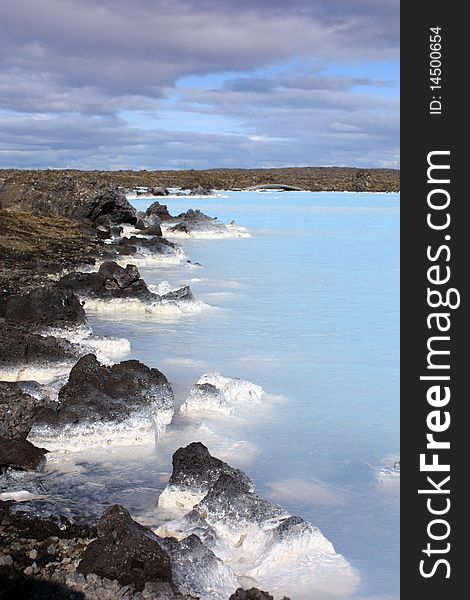 The bright blue waters of the blue lagoon in iceland famous for its thermal spa