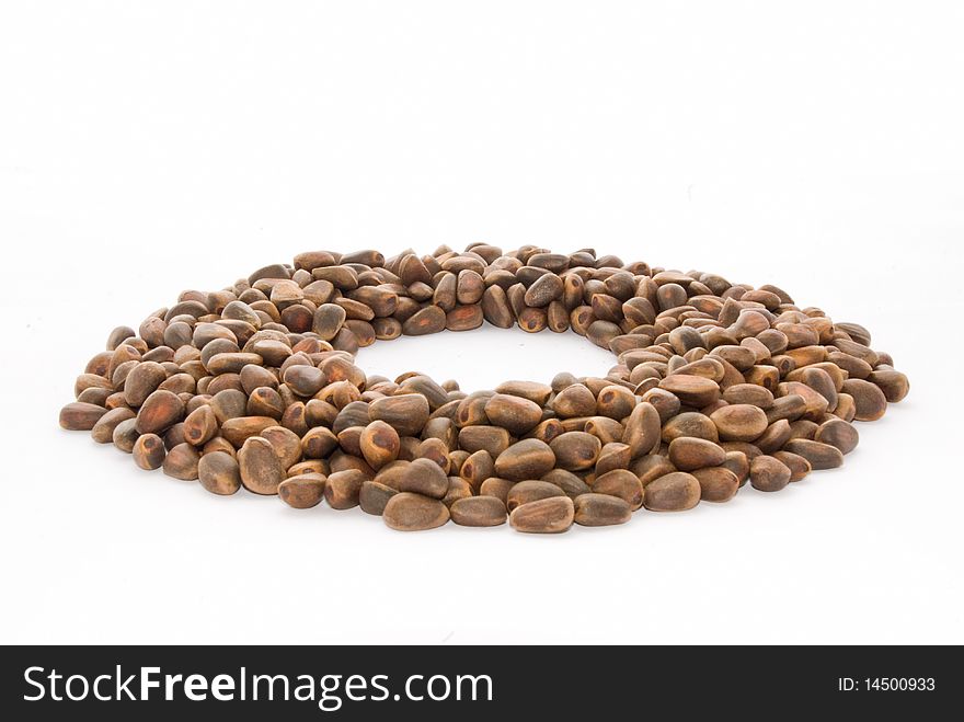 Cedar nutlets on a white background