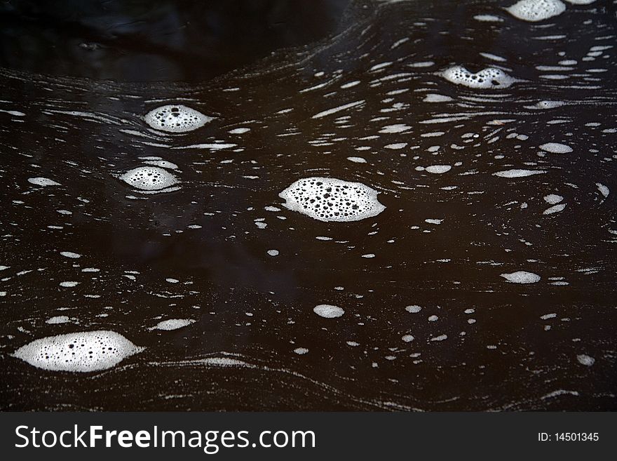 Blanching spume on surfaces water