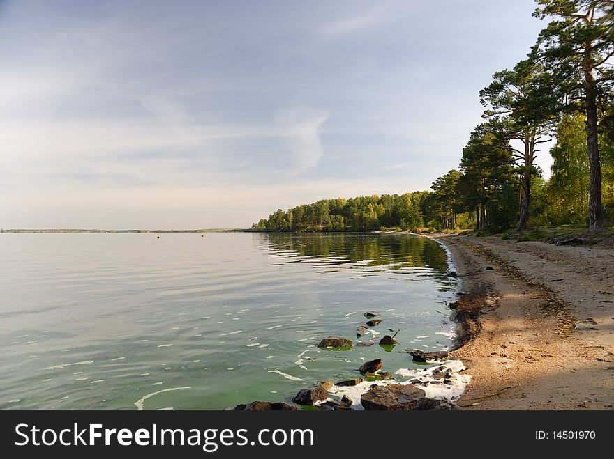 Autumnal beach, on the shore of the like