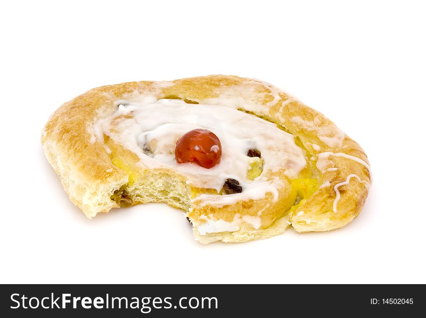 Danish pastry with a bite taken isolated on a white background