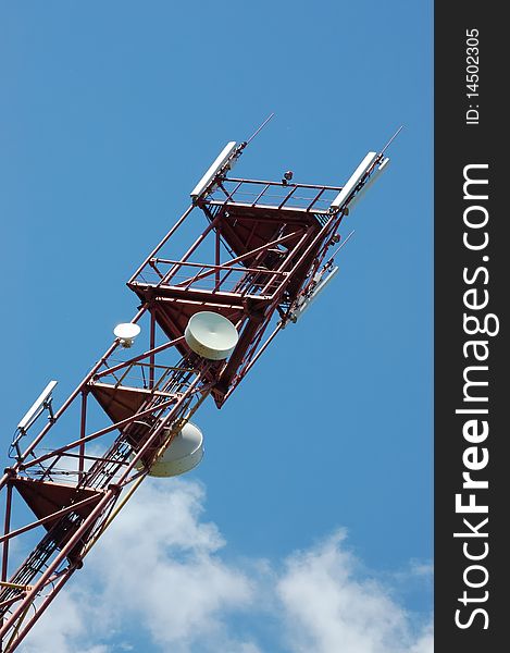 Telecommunication tower on blue sky