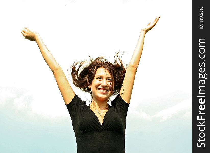 Young Beautiful Brunette Girl Keeps Hands Up Outdo