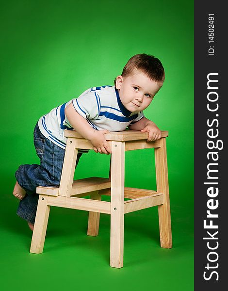 Little Boy On Stairs In Studio