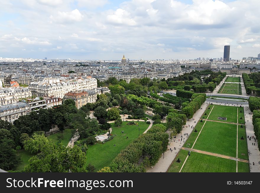 The Champ de Mars is a large public greenspace in Paris, France. View from Eiffel Tower.