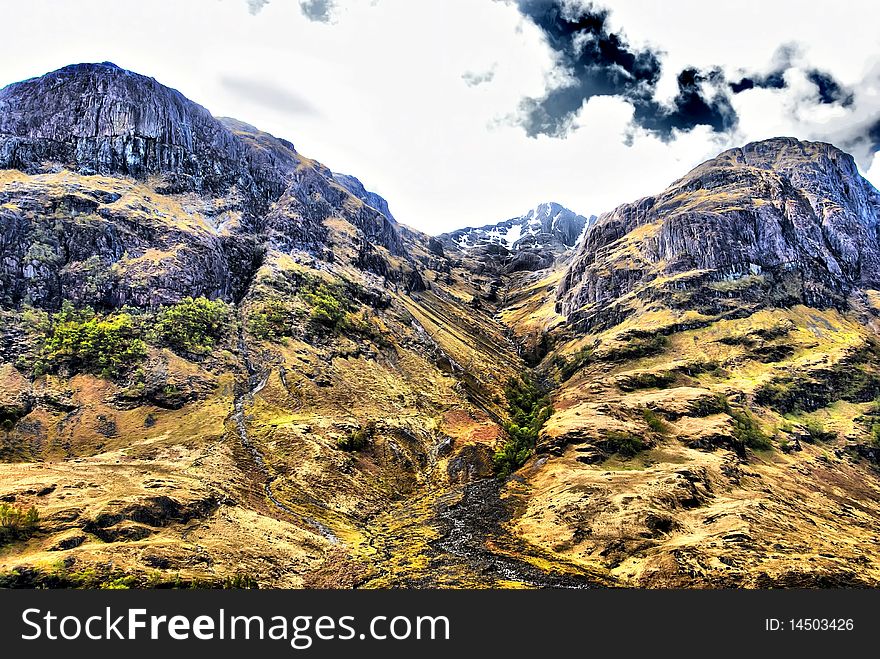 View of mountain range above Scotch mountain, Scotland, United Kingdom. High dynamic contrast