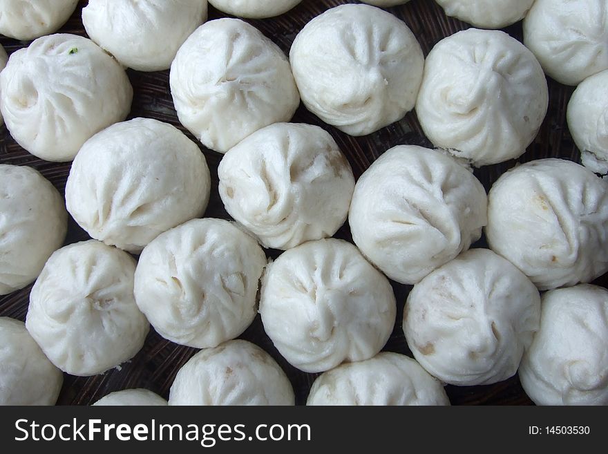 Traditonal chinese steamed bun stuffed with savory meat. Traditonal chinese steamed bun stuffed with savory meat