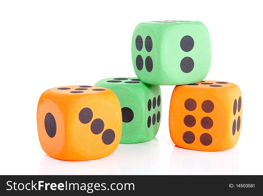 Four colorful green and orange dice isolated over white. Four colorful green and orange dice isolated over white