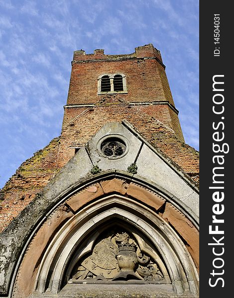 Building details of old church located in Stanmore London, blue sky in background. Building details of old church located in Stanmore London, blue sky in background