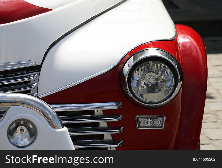 Close up of retro red car grill