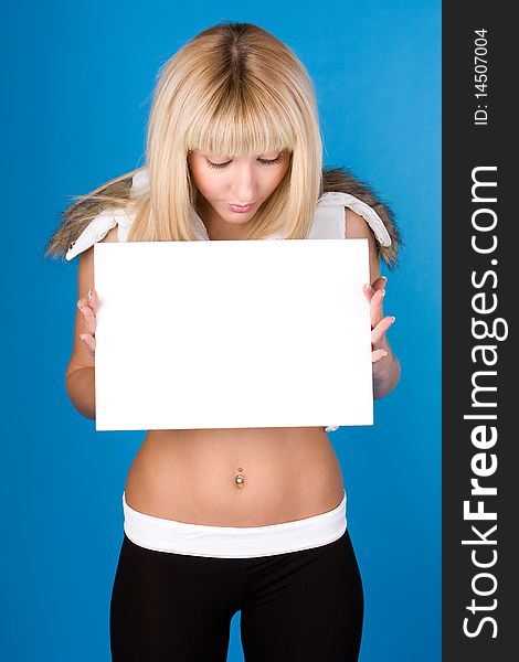 Closeup portrait of cute young woman holding a white page. Closeup portrait of cute young woman holding a white page