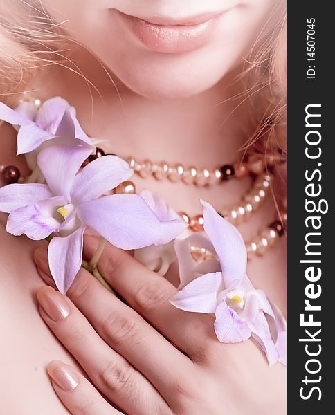 Beautiful girl with violet orchid. Beautiful girl with violet orchid