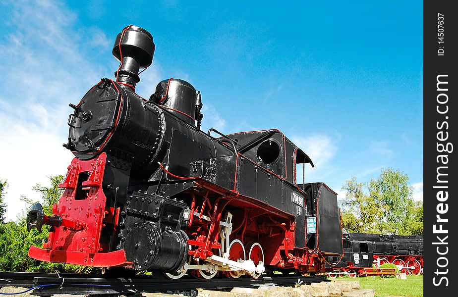 Black old steam locomotive reconditioned. Black old steam locomotive reconditioned