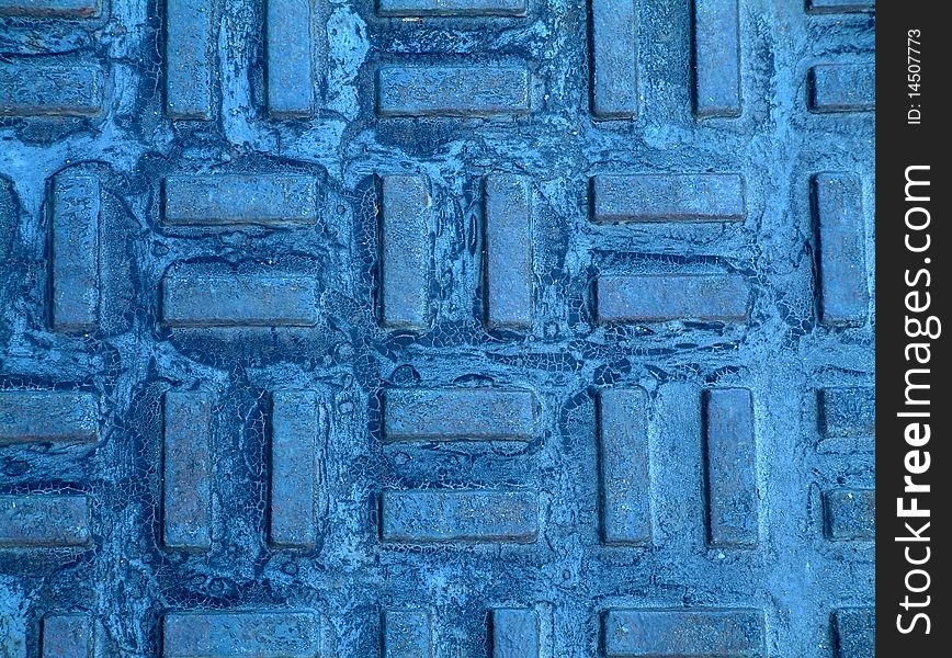 Blue brick mosaic on sidewalk from dowtown Winnipeg, Manitoba, Canada