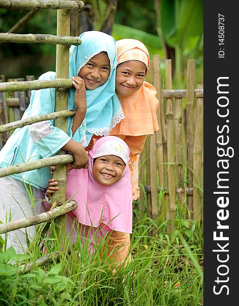 Outdoor portrait of happy Muslim kids. Outdoor portrait of happy Muslim kids