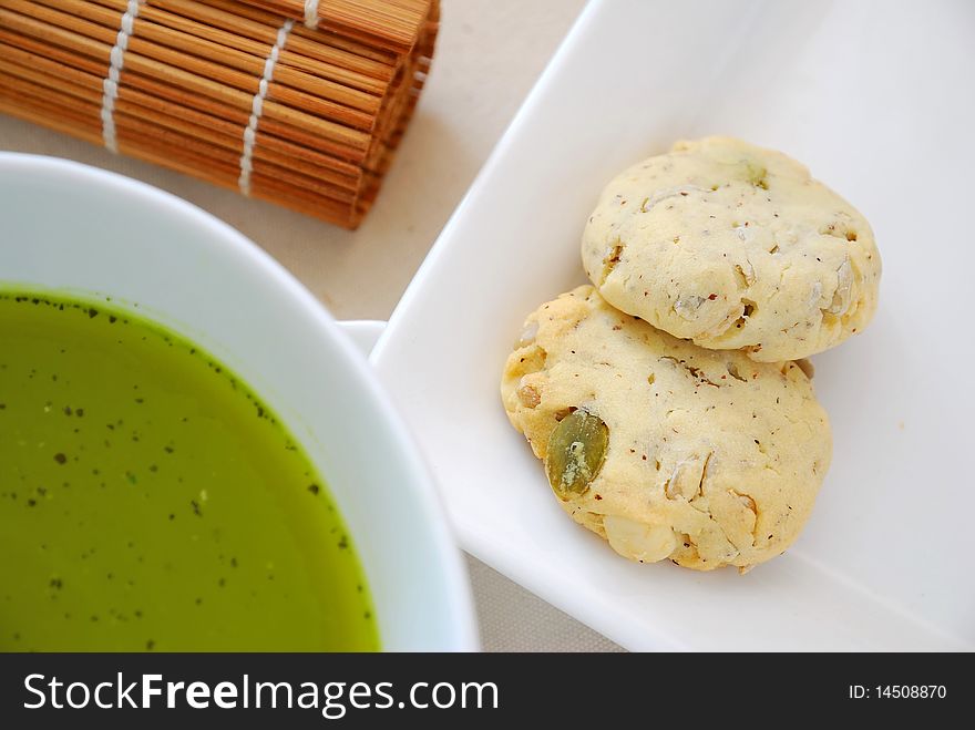 Cookies with healthy green tea. For food and beverage, diet and nutrition, and health concepts.